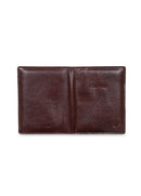 Brown leather passport holder on a white background